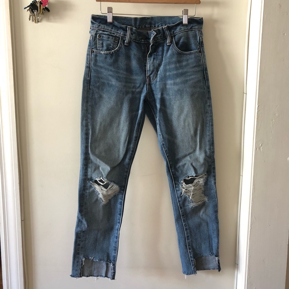 Levi’s 505 Distressed Step Hem Jeans